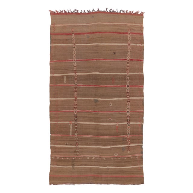This vintage 5x10 mid-century tribal runner flatweave is a remarkable addition to Rug & Kilim’s Moroccan collection....