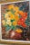 Age: approx. 40 years old Details: Thick textured brushstrokes featuring a bouquet of red, orange and yellow marigolds in...