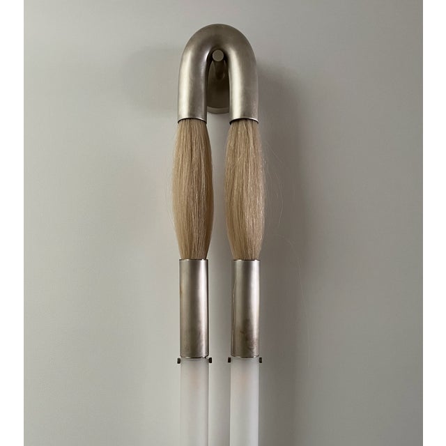 A robust study of material that evokes the grace and strength of its equine contributor. Wefts of horsehair are combined...