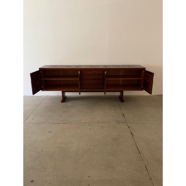 Credenza designed by Poul H. Poulsen and manufactured by Gangsø Møbler, Denmark, circa 1970s. Executed in rosewood veneer...