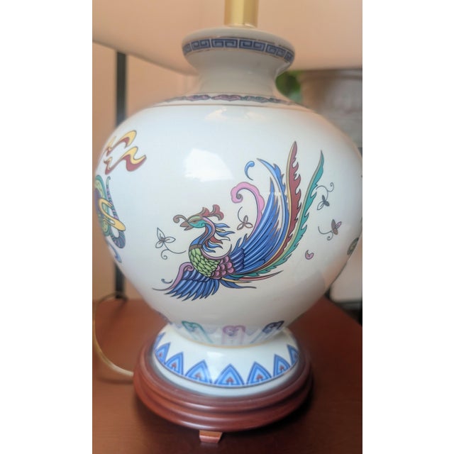 This is "The Lamp of the Celestial Legends," a vintage fine porcelain table lamp produced by the Franklin Mint in 1991. It...