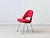 An elegant executive chair by eero saarinen for knoll international, featuring a sculpturally shaped seat shell and a...