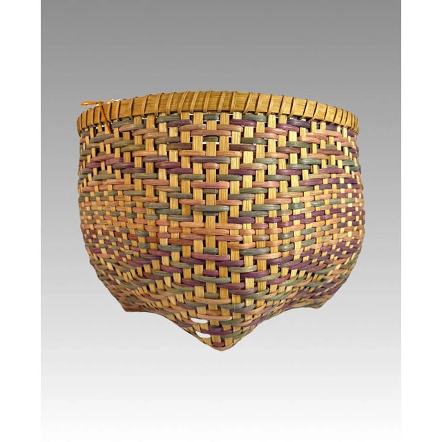 Useful and good sized storage pretty basket for items like towels, vegetables or even golf balls! All hand made in St...