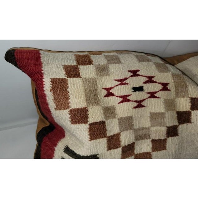 Beautiful large weaving bolster pillow. 18 x 36. Feather and Down insert and Zippered Label.