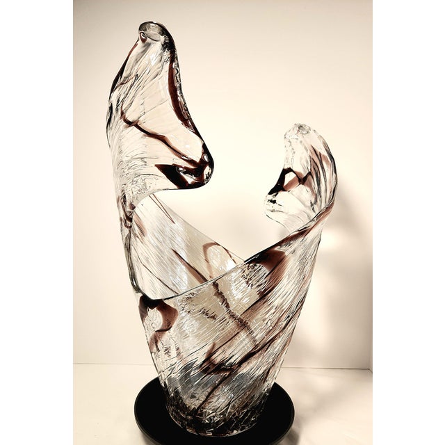 Make a breathtaking statement in your home or collection with this magnificent vintage Murano art glass sculptural vase....