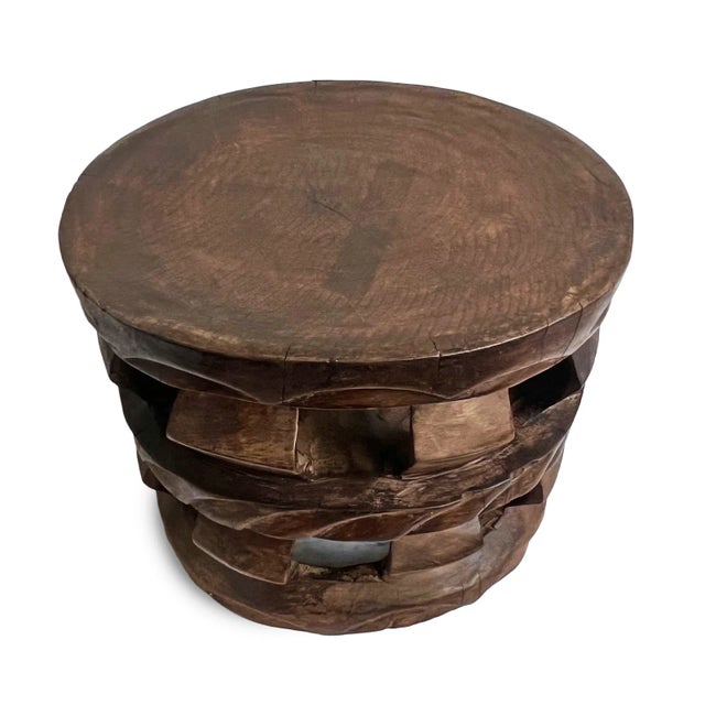 Vintage old round stool or low side table from the Dogon people of Mali. Rustic patina with authentic signs of age and...