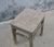 A charming vintage Chinese stool crafted from solid elmwood, dating to the first half of the 20th century. The substantial...