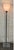 This vintage chrome floor lamp with smoked glass torchiere shading is an example of space age or atomic design trends in...