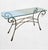 Elevate your entryway or living space with this sophisticated Italian and console table, reminiscent of the whimsical and...