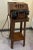Crank Telephone with Stand. Telephone is 11" wide x 7" tall x 10" deep. Table is 21" tall x 9.5" deep and wide....