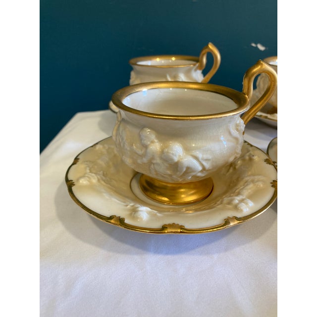 Early 20th Century Antique Ernst Bohne Söhne Cherub Teacup and Saucer With Gold Trim Set- 14 Pieces For Sale - Image 5 of 10