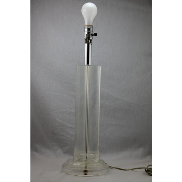 A beautiful Mid Century Modern Tri Columned Lucite Lamp. Very good condition, new wiring, up to 250 watt. Edison.