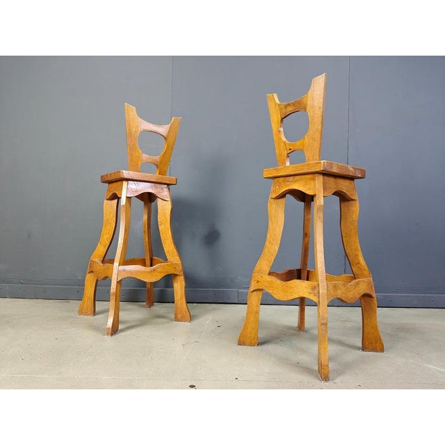 Attractive hand crafted brutalist bar stools. Beautifully shaped stools with backrests and very elegant curves. Made from...