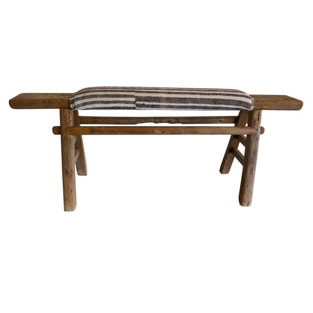 Fragments Identity Antique Hardwood Bench, a global antique hand carved hardwood bench upholstered in vintage hand-spun...