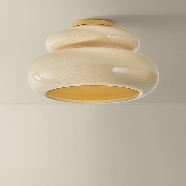 An exploration of voluminous forms and soft, endearing colors, the Pia family leans into the playful side of lighting....