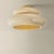 An exploration of voluminous forms and soft, endearing colors, the Pia family leans into the playful side of lighting....