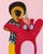 Plushie V by Ayobola Kekere-Ekun | Mixed media Colorful figure holding a red bear. For Sale