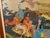A whimsical depiction of Egyptian life along the Nile River done in vibrant colored threads. This needlepoint artwork is a...