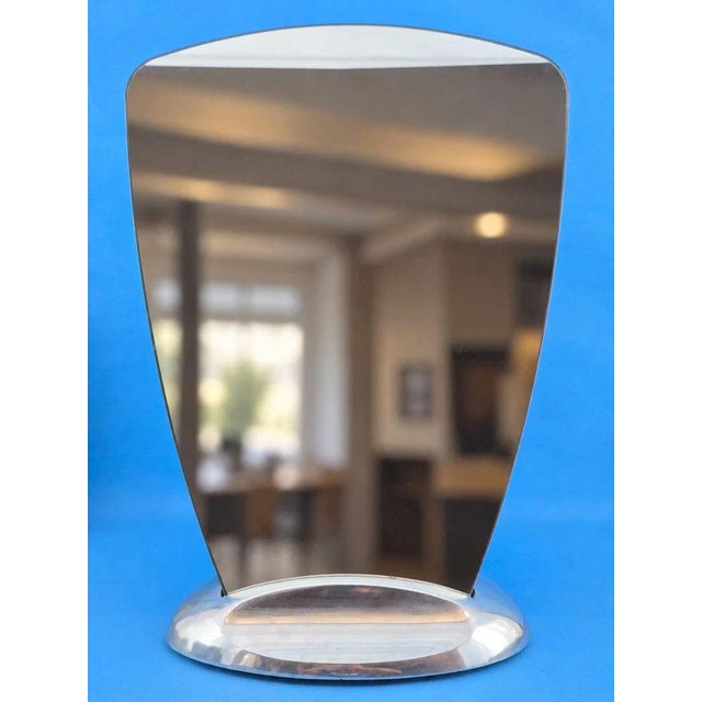 MEASUREMENTS: Height: 34 cm; Width: 33.5 cm; Depth: 8.5 cm; Weight: 2.385 kg Item : A refined and unusual double-sided...