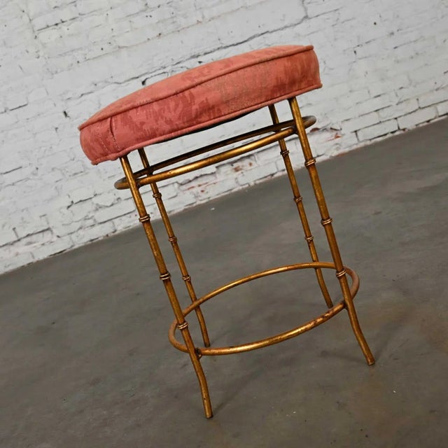 Gorgeous vintage mid-20th century Italian style round stool with rose damask seat & gilt metal faux bamboo legs. Beautiful...