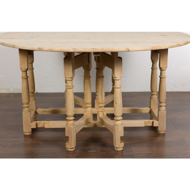 English Pine 19th Century Drop Leaf Table with Oval Top and Carved Apron For Sale - Image 11 of 12