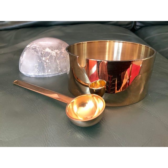Gold plated sugar and creamer set with alabaster (marble tops): creamer with top is 5 in. tall with a diameter of 2 1/2...