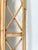 A large mid 20th century Italian bamboo wall mirror. This vintage piece has a rectangular mirror glass is surrounded by an...
