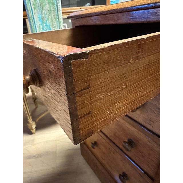 Beautiful antique oak partner's desk with nine drawers on each side. In very good condition throughout. Lovely light color...