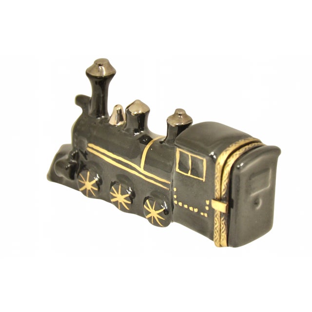 Limoges of France trinket accent box designed as a vintage train engine hand painted in 24K gold, silver, red and black...