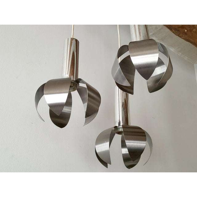 Good overall condition, but the plastic cylindrical tubes show numerous signs of wear. The brushed steel is in very good...