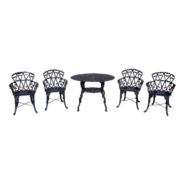 Mid-Century Ornate Cast Aluminum Patio Dining Set – Filigree Round Table With 4 Heart-Back Armchairs For Sale
