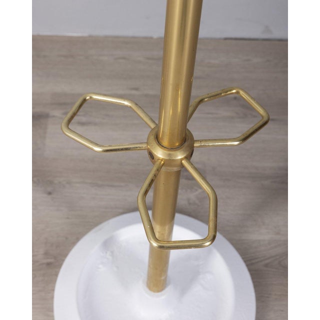 Floor coat rack with white cast iron base and gold-plated brass body, Italian design, 1960s.