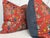 Custom pair of 22" pillows covered in an embroidered linen in an ikat pattern on a tomato colored linen and backed in a...