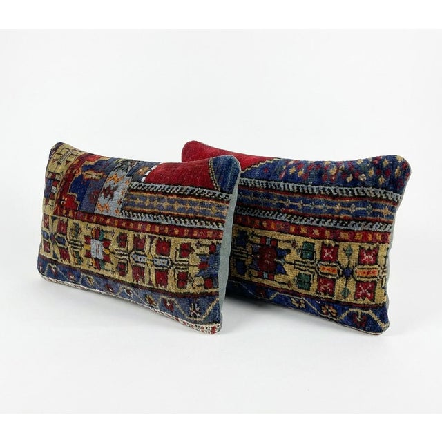 This beautiful 15'' x 23'' & 15'' x 25'' pillow cover set was made from authentic Turkish rug pieces. Bright colors of...