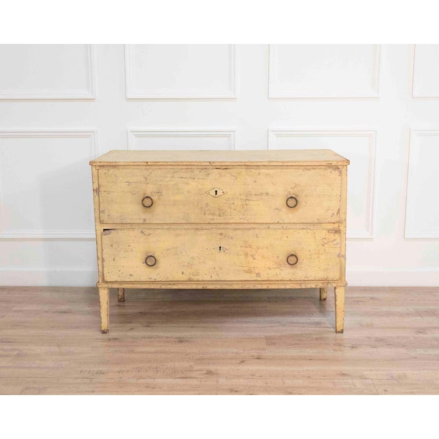 A handsome late eighteenth-century chest of drawers from the Alsace region of France, crafted in pine and retaining its...