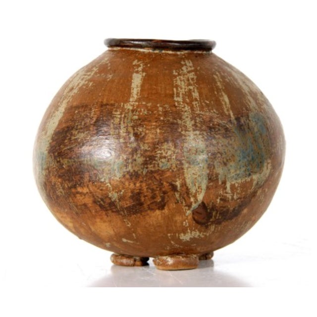 A beautifully formed mid-century studio pottery vase featuring a classic bulbous silhouette and handcrafted character....