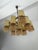 Nine-light chandelier in the style of Gaetano Sciolari for Stilnovo, 1970 Modular, geometric structure in gold-plated...