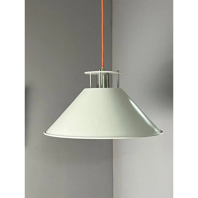 Designed by C.F. Møller Architects for Nordisk Solar, this pendant lamp embodies the clean, functional language of Danish...