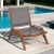 Enhance your outdoor living with the Draper Sling Chat Chair by Hi-Teak. Constructed from premium teak and durable,...