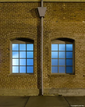 Contemporary Night Photograph "Arched Windows" by John Vias