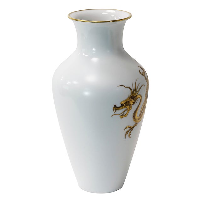 A satin white background german Heinrich porcelain vase hand painted with relief golden dragon decor. Marked on the base....