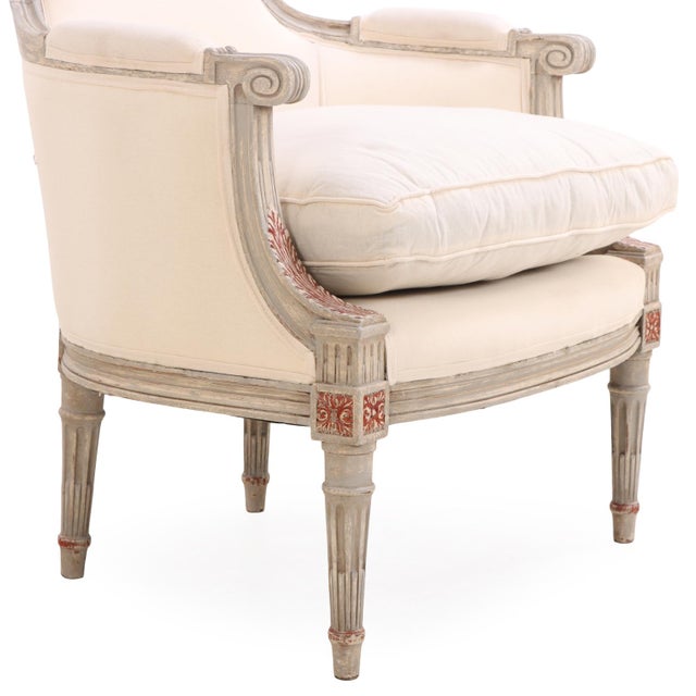 French A Pair of Louis XVI Style Grey Painted and Partial Gilt Bergere Chairs, C. 1940. For Sale - Image 3 of 4