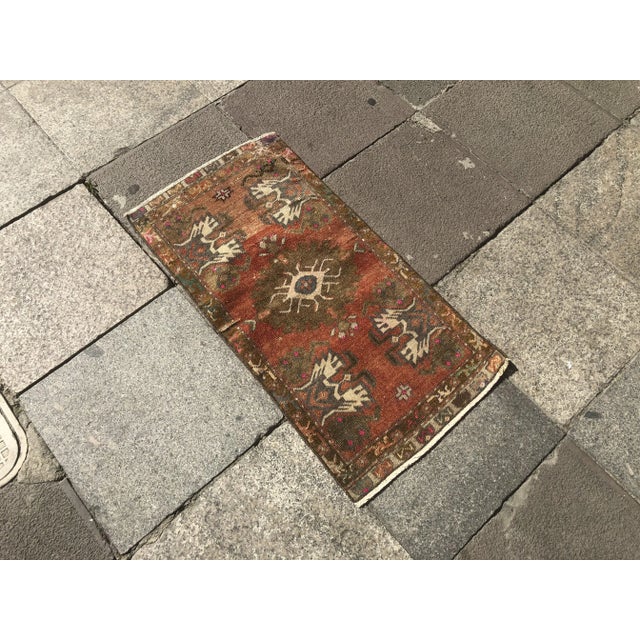 This is a vintage Turkish Oushak rug from the 1960s. The piece was hand-knotted.