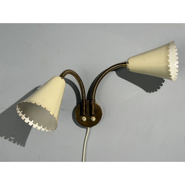 Arvid Böhlmarks, Swedish Mid-Century Modern, Wall Light or Sconce, Brass, Lacquered Metal, Sweden, 1940s A patinated brass...