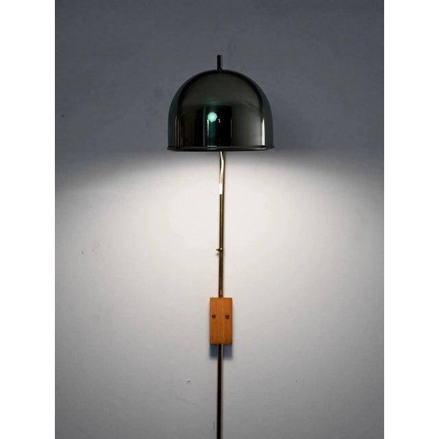 Vintage Scandinavian wall lamp, model V-75, designed by Eje Ahlgren for Bergboms in the 1960s. Made of brass with an...