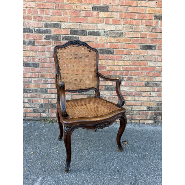 This is an amazing pair of Early 20th century French cane seat chairs with beautiful patina. The seat and back rest have...