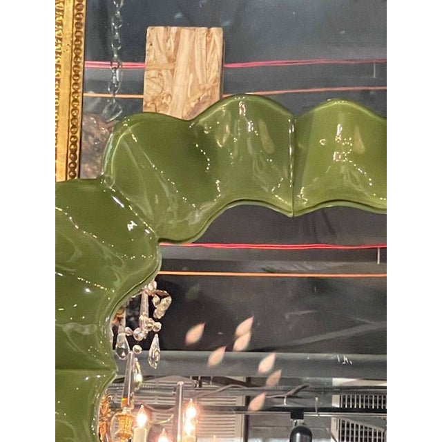 The Murano Wave Mirror in Olive Green is a unique and decorative mirror. With it's sculptural form make it is sure to be a...