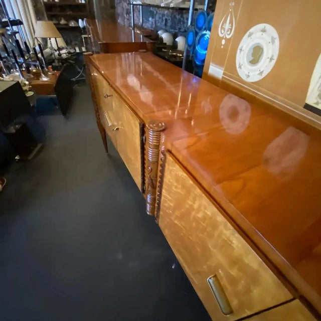 This Large Sideboard by Pier Luigi Colli is an exquisite and iconic piece of furniture that exemplifies the craftsmanship...