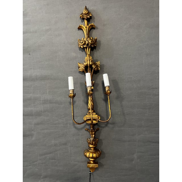 Early 20th century wooden wall lamp, dimensions: height 107 cm, depth 21 cm, width 27 cm. Hand-carved wood. Floral motif...