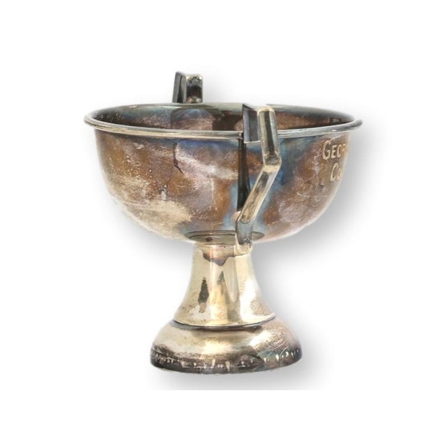 Petite English silverplate trophy engraved "George Irving Trophy, Colt of the Year." A wonderful equestrian accent with...